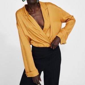 Zara golden satin bodysuit with jeweled button detail